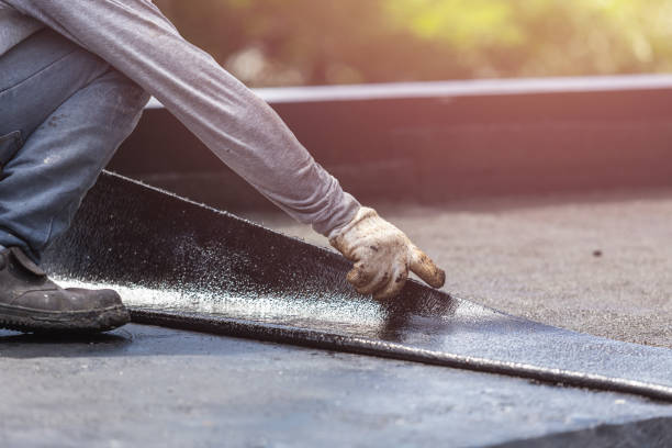 Professional Basement Waterproofing technician working in Dayton, OH